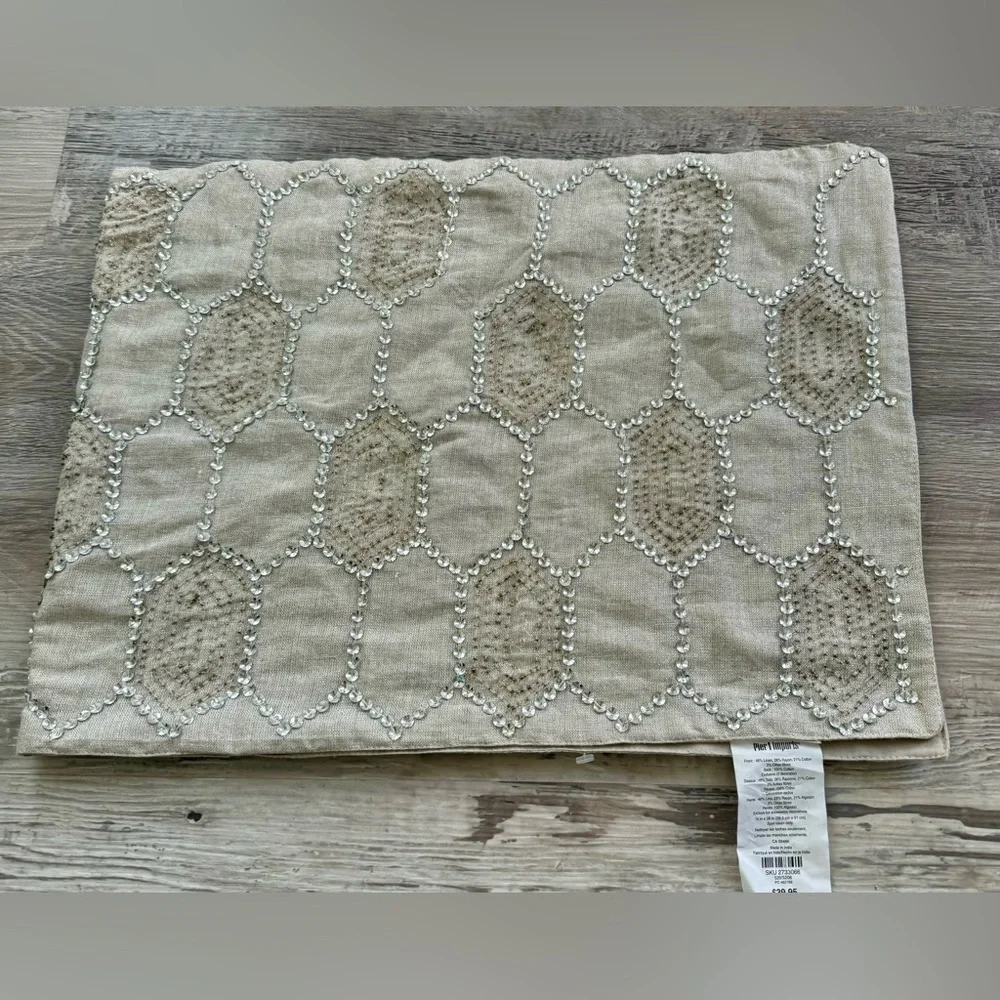 Pier 1 Imports taupe table runner with embroidered hexagon pattern